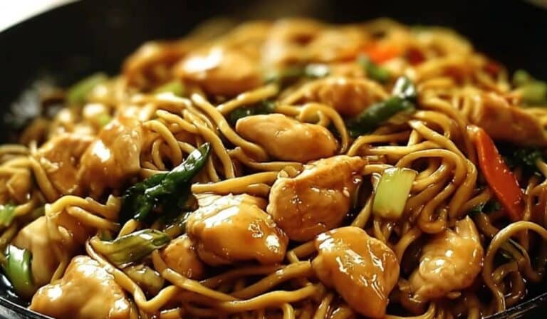 Garlic Chicken Lo Mein served in a skillet with vegetables