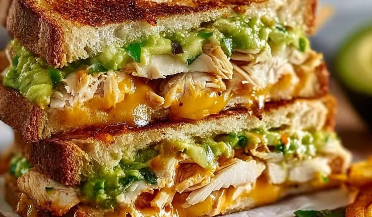 Chicken Avocado Melt Sandwich with grilled bread, melted cheese, and fresh avocado