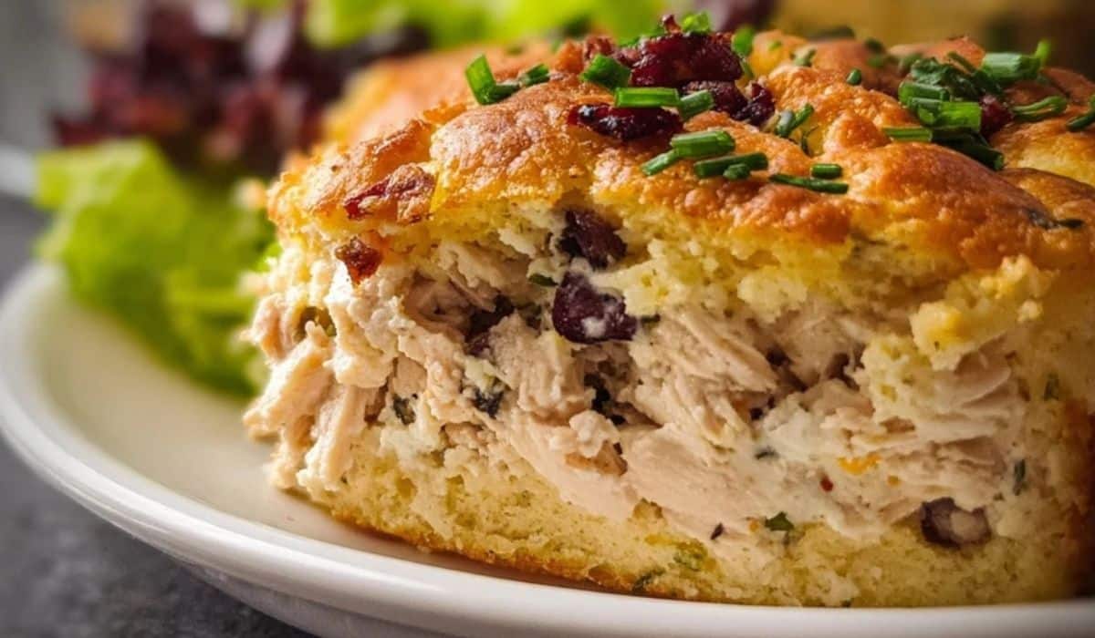 Baked Grits Casserole with golden crust and creamy chicken filling