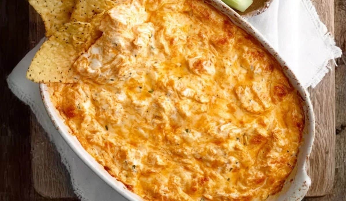 Creamy Greek Yogurt Buffalo Chicken Dip served hot with tortilla chips