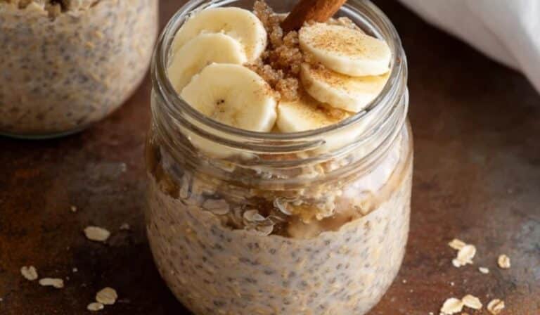 Brown Sugar Overnight Oats topped with sliced bananas and cinnamon in a mason jar