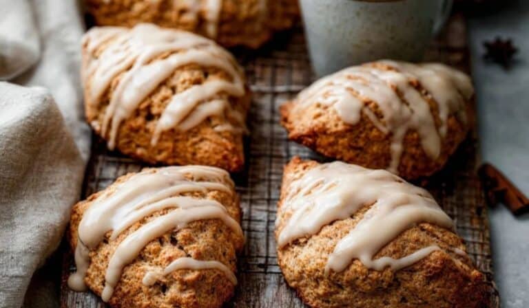 Maple Chai Glazed Scones served with chai latte on rustic table