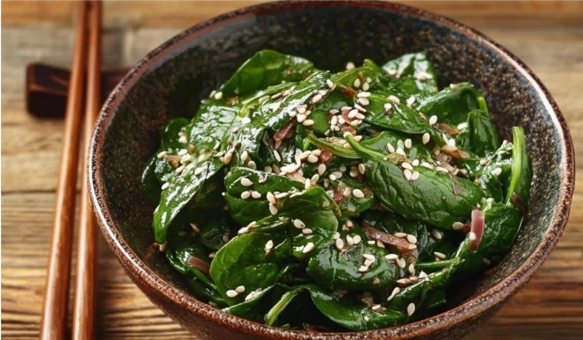 Japanese Spinach Salad with Sesame Dressing in rustic bowl