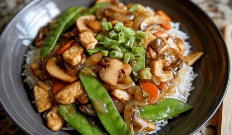 The Best Moo Goo Gai Pan served with vegetables and tender chicken in garlic sauce