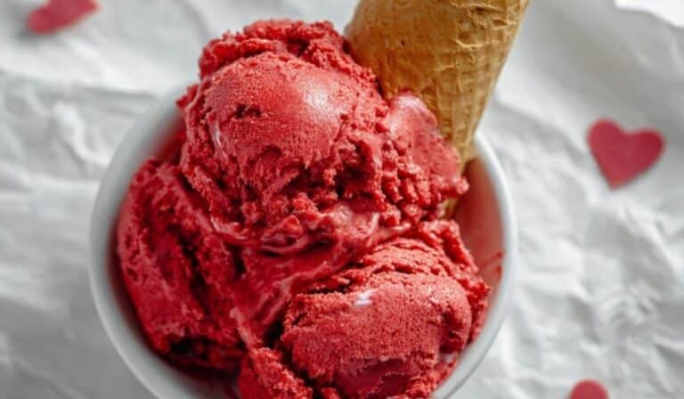 Best red velvet ice cream with cream cheese swirls and cake crumbs in a bowl