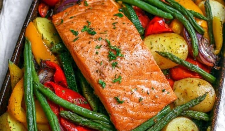 30-minute one-pan salmon and veg on a sheet pan with roasted potatoes and colorful veggies