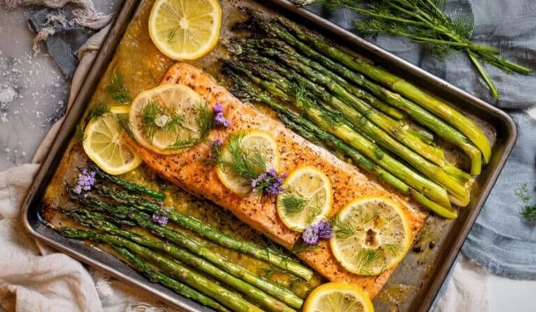 One-pan salmon with asparagus on a sheet pan with lemon and parsley